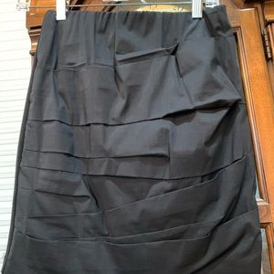 BCBG MAXAZRIA new with no tags skirt Front is lined and draped back is stretchy